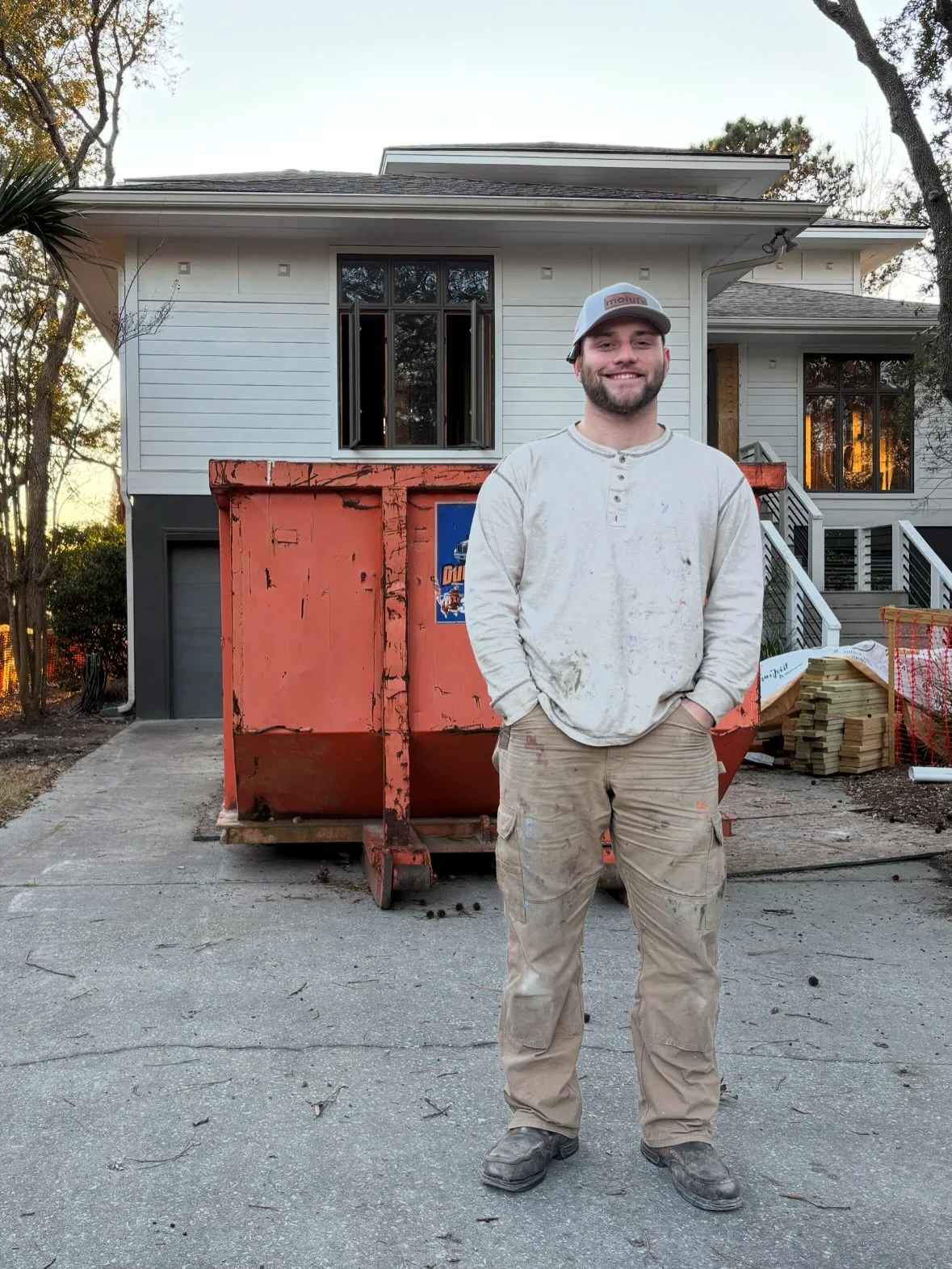 Southern Flow Plumbing owner Chase Sandler smiling at a Charleston job site