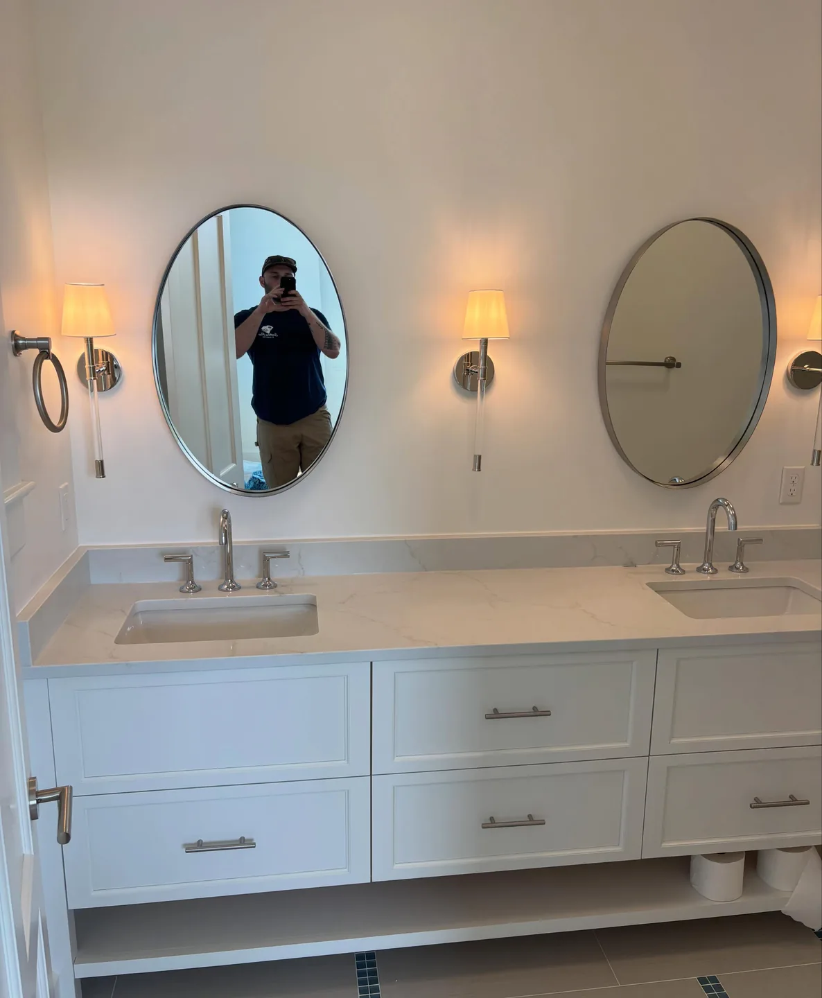Finished double vanity with installed fixtures at a Sullivan’s Island home